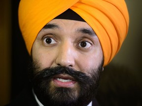 Navdeep Bains, Minister of Innovation, Science and Economic Development, speaks to media following a cabinet meeting on Parliament Hill in Ottawa on Tuesday, Jan. 29, 2019.