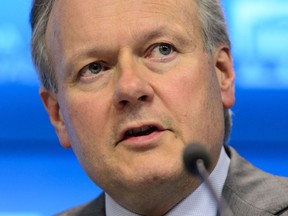 Stephen Poloz, Governor of the Bank of Canada answers a question during a press conference at the Bank Of Canada in Ottawa on Thursday, May 16, 2019.