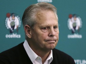 In this May 17, 2016, file photo, Boston Celtics president of basketball operations Danny Ainge pauses while answering a reporter's question at the team's training facility in Waltham, Mass. (AP Photo/Charles Krupa, File)