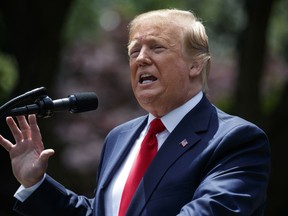President Donald Trump speaks during the presentation of the Commander-in-Chief's Trophy to the U.S. Military Academy at West Point football team, in the Rose Garden of the White House, Monday, May 6, 2019, in Washington.