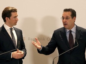 In this Tuesday, Dec. 4, 2018 file photo, Austria's Chancellor Sebastian Kurz and Austrian Vice Chancellor Heinz-Christian Strache, from left, hold a joint press conference after one year government in Austria at the Hofburg palace in Vienna, Austria.