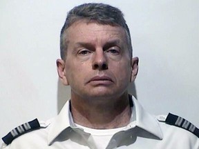 This undated photo provided by the Christian County (Ky.) Detention Center shows Christian R. Martin. Martin, a pilot for an American Airlines subsidiary was arrested Saturday, May 11, 2019 in the 2015 shooting deaths of three people in Kentucky, the state attorney general announced. (Christian County, Kentucky, Detention Center via AP)