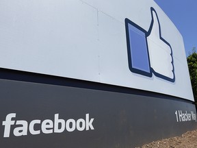 This July 16, 2013 file photo shows a sign at Facebook headquarters in Menlo Park, Calif. (AP Photo/Ben Margot, File)