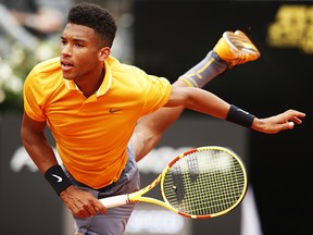 Felix Auger-Aliassime serves during his first-round match against Borna Coric at Foro Italico on May 13, 2019 in Rome, Italy. (Adam Pretty/Getty Images)