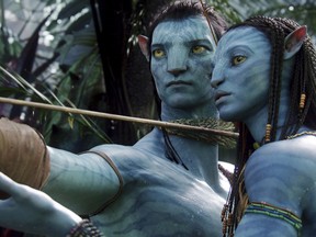 This image released by 20th Century Fox shows the characters Neytiri, right, and Jake in a scene from the 2009 movie "Avatar." (AP Photo/20th Century Fox, File)