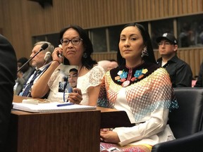 Debbie Baptiste, left, and Jade Tootoosis are shown at United Nations building in New York in this still from the documentary "nipawistamasowin: We Will Stand Up" in this handout photo.