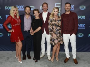 Tori Spelling, from left, Jason Priestley, Gabrielle Carteris, Ian Ziering, Jennie Garth and Brian Austin Green, from the cast of "BH90210," attend the FOX 2019 Upfront party at Wollman Rink in Central Park on Monday, May 13, 2019, in New York.