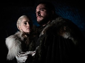 This image released by HBO shows Emilia Clarke and Kit Harington in a scene from "Game of Thrones," that aired Sunday, April 21, 2019.
