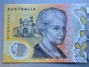 This photo illustration shows the detail in Australia's state-of-the-art new 50 dollar banknote in Sydney on May 9, 2019, with a spelling mistake in the microprint of a speech by Australia's first woman parliamentarian Edith Cowan. (PETER PARKS/AFP/Getty Images)