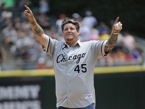 Former Chicago White Sox Bobby Jenks throws out the ceremonial first pitch before the game between the Chicago White Sox and the Baltimore Orioles on July 4, 2015 at U. S. Cellular Field in Chicago, Ill. (David Banks/Getty Images)