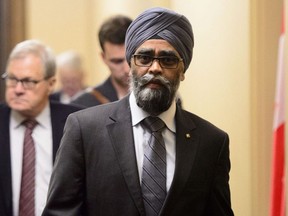 Minister of National Defence Minister Harjit Sajjan leaves a cabinet meeting on Parliament Hill in Ottawa on Tuesday, May 14, 2019.