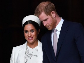 Britain's Prince Harry, Duke of Sussex (right) and Meghan, Duchess of Sussex leave after attending a Commonwealth Day Service at Westminster Abbey in central London on March 11, 2019.