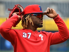 Odubel Herrera of the Philadelphia Phillies adjusts his cap as he prepares for batting practice at Kauffman Stadium on May 11, 2019 in Kansas City. (Ed Zurga/Getty Images)