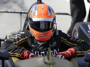 James Hinchcliffe, of Canada, climbs out of his car during qualifications for the Indianapolis 500 at Indianapolis Motor Speedway, Saturday, May 18, 2019 in Indianapolis. (AP Photo/Darron Cummings)