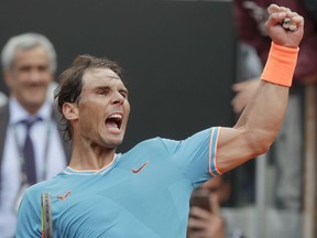 Rafael Nadal of Spain celebrates after defeating Stefanos Tsitsipas of Greece during a semifinal match at the Italian Open tennis tournament, in Rome, Saturday, May 18, 2019. Nadal won 6-3, 6-4.