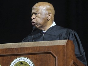 Civil rights icon and U.S. Rep. John Lewis delivers the commencement address during the Framingham State University's undergraduate commencement ceremony at the DCU Center in Worcester, Mass., on Sunday, May 26, 2019. (Dan Holmes/The Metro West Daily News via AP)