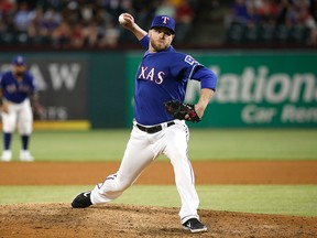 Shawn Kelley of the Texas Rangers throws against the Toronto Blue Jays during the ninth inning at Globe Life Park in Arlington on May 4, 2019 in Arlington, Texas.