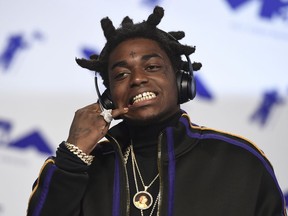 FILE - In this Aug. 27, 2017 file photo, Kodak Black arrives at the MTV Video Music Awards at The Forum in Inglewood, Calif. Officials say Florida rapper Kodak Black was arrested on federal and state weapons charges just before he was to perform at a hip-hop festival. The U.S. Marshals office says in a news release that the 21-year-old Black was taken into custody Saturday, May  11, 2019 at the Rolling Loud Music Festival at Hard Rock Stadium in Miami Gardens. The statement didn't elaborate.