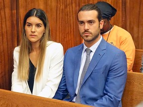 Mexican soap opera star Pablo Lyle, right, and his wife Ana Araujo wait before appearing in Miami-Dade, Fla., circuit court on Monday, April 8, 2019.