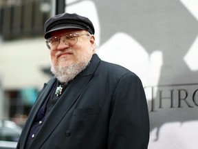 In this March 18, 2013 file photo, author George R.R. Martin arrives at the premiere for the third season of the HBO television series "Game of Thrones" at the TCL Chinese Theatre in Los Angeles.