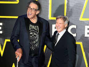In this Dec. 16, 2015 file photo, Peter Mayhew and Harrison Ford attend the European Premiere of "Star Wars: The Force Awakens" at Leicester Square in London, England.