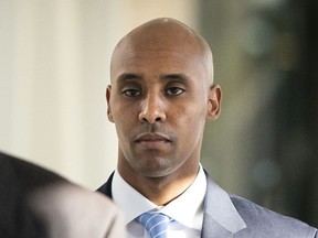 In this Friday, April 26, 2019, file photo, former Minneapolis police officer Mohamed Noor walks to court in Minneapolis.