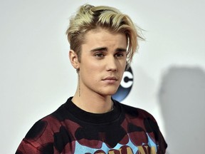 This Nov. 22, 2015 file photo shows Justin Bieber at the American Music Awards in Los Angeles. YouTube announced Thursday, May 2, 2019, that it is planning a project with the Grammy-winning Canadian pop star, set to premiere next year.