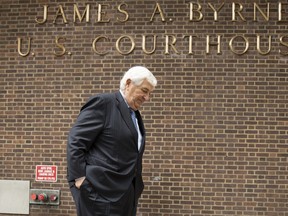 Attorney Gene Locks, who represents many former NFL players, walks from the federal courthouse in Philadelphia after a hearing, Tuesday, May 7, 2019.