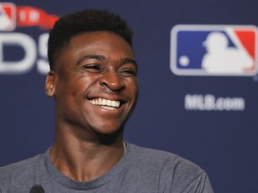 In this Oct. 7, 2018, file photo, New York Yankees shortstop Didi Gregorius answers questions during a baseball news conference in New York.