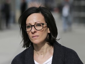Lauren Salzman leaves Brooklyn federal court in New York. Salzman could be one of the former members of the group, NXIVM, who are poised to break their vow of silence for the first time by testifying against the group's one time leader, Keith Raniere, at a trial set to begin on Tuesday, May 7, 2019.