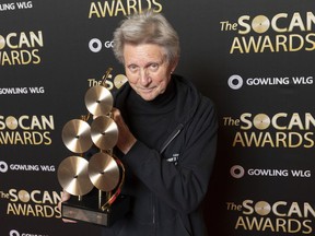 Ralph Murphy holds his SOCAN Special Achievement Award at the SOCAN Awards in Toronto on April 1, 2019.