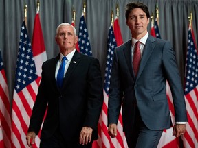 Prime Minister Justin Trudeau and U.S. Vice-President Mike Pence leave a joint news conference during a visit in Ottawa on Thursday, May 30, 2019.