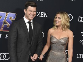 In this April 22, 2019, file photo, Colin Jost, left, and Scarlett Johansson arrive at the premiere of "Avengers: Endgame" at the Los Angeles Convention Center. Wedding bells are in the future for actress Scarlett Johansson and Saturday Night Live's Colin Jost. Johansson's publicist Marcel Pariseau tells The Associated Press Sunday, May 19, 2019, that the private couple is officially engaged after two years of dating. Pariseau says no date has been set for the nuptials.