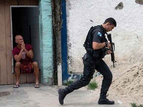 In this file photo taken on May 3, 2018, Brazilian military police stage an operation at the "Cidade de Deus" favela in Rio de Janeiro, Brazil. (MAURO PIMENTEL/AFP/Getty Images)