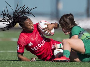Canada's Charity Williams (left) is tackled by Ireland's Amee Leigh Murphy Crowe during the World Rugby Women's Sevens Series in Langford, B.C., Saturday, May, 12, 2018.