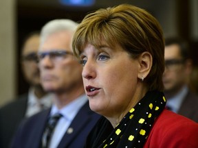 Marie-Claude Bibeau, Minister of Agriculture and Agri-Food, and Jim Carr, Minister of International Trade Diversification, provide an update on the government's response to the canola trade dispute with China during a press conference on Parliament Hill in Ottawa on Wednesday, May 1, 2019.THE CANADIAN PRESS/Sean Kilpatrick