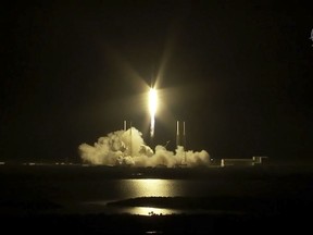 In this image taken from NASA Television, a SpaceX Falcon rocket carrying a load of supplies lifts off from Cape Canaveral, Fla. Saturday. May, 4. 2019.