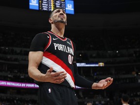 Portland Trail Blazers centre Enes Kanter reacts after being called for a foul against the Denver Nuggets Monday, April 29, 2019, in Denver.