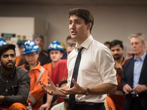 Prime Minister Justin Trudeau speaks with employees at Stelco in Hamilton, Ont., Friday, May 17, 2019.