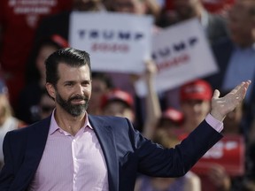 Donald Trump Jr., gestures at a rally for his father, U.S. President Donald Trump in Montoursville, Pa., Monday, May 20, 2019.