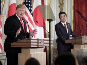 U.S. President Donald Trump, left, speaks as Japanese Prime Minister Shinzo Abe listens during a news conference at Akasaka Palace in Tokyo Monday, May 27, 2019.