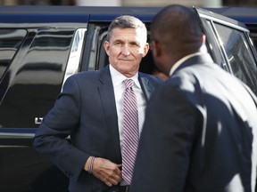 In this Dec. 18, 2018, file photo, U.S. President Donald Trump's former national security adviser Michael Flynn arrives at federal court in Washington.