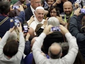 Pope Francis arrives for an audience with participants of a pilgrimage of the Italian-Albanian diocese of Lungro, in the Pope Paul VI hall, at the Vatican, Saturday, May 25, 2019.