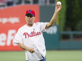 Bruce Willis throws out the first pitch prior to the game between the Milwaukee Brewers and the Philadelphia Phillies at Citizens Bank Park on May 15, 2019 in Philadelphia, Pa.