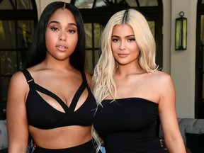 Jordyn Woods (L) and Kylie Jenner attend the launch event of the activewear label SECNDNTURE by Jordyn Woods at a private residence on Aug. 29, 2018 in West Hollywood, Calif.