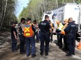 Greater Sudbury Police, North Shore Search and Rescue and Dr. Scott Fairgrieve, professor at the Department of Forensic Science at Laurentian University, search for human remains off of a section of Nelson Lake Road in Valley East, Ont. on Monday May 27, 2019. (John Lappa/Sudbury Star/Postmedia Network)