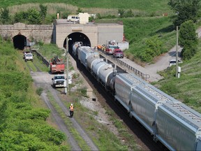 Crews from CN and Sarnia Fire Rescue respond Friday morning to a derailment in the CN Tunnel under the St. Clair River, between Sarnia and Port Huron, Mich. Paul Morden/Sarnia Observer