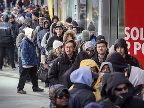 Lines to get into the downtown Société québécoise du cannabis in Montreal on Thursday October 18, 2018.