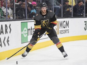 Colin Miller of the Vegas Golden Knights looks to head-man the puck during a February 2019 NHL game against the Dallas Stars at T-Mobile Arena in Las Vegas.