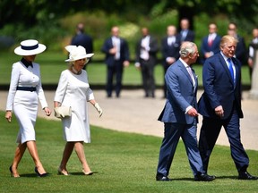 U.S. President Donald Trump (R) and First Lady Melania Trump (L) are greeted by Camilla, Duchess of Cornwall and Prince Charles, Prince of Wales at Buckingham Palace on June 3, 2019 in London. (Photo by Jeff J Mitchell/Getty Images)